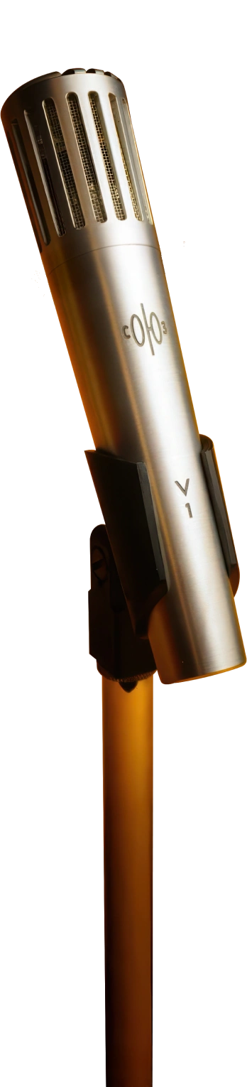 Soyuz V1 Dynamic Microphone - Silver studio microphone with orange gradient lighting in professional recording environment